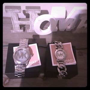 Two women’s Michael Kors watches